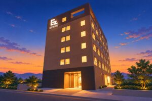 夕暮れの空の下に建つEZ HOTEL 関西空港 Seasideの外観を描いたイラスト